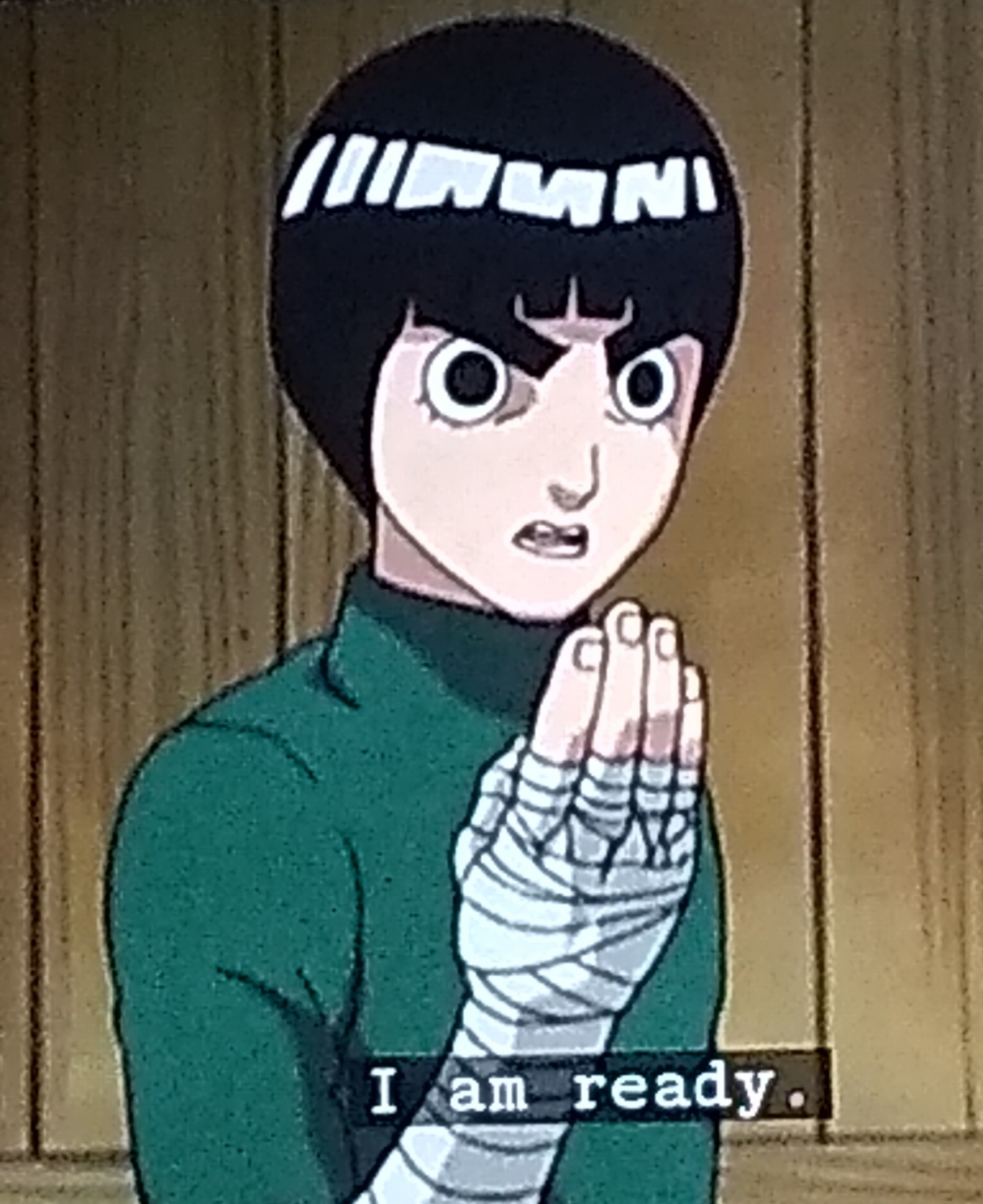 Rock Lee, de Naruto, le poing bandé levé devant lui, avec le sous-titre I am ready